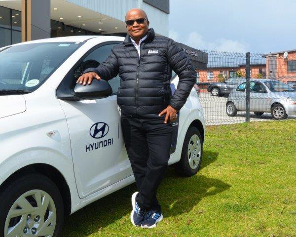 'Boots 'n all' Boosman locks in car sales through rugby